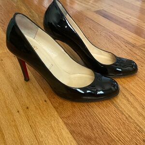 Christian Louboutin black patent pumps